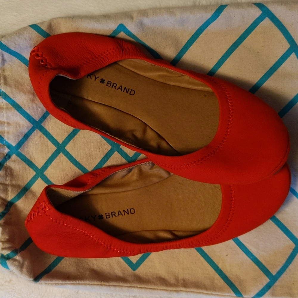 Lucky brand reddish-orange flats.Like new. Size 7.5.